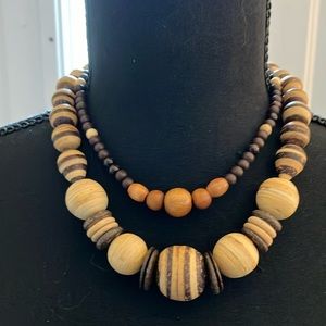 2 wooden bead necklaces